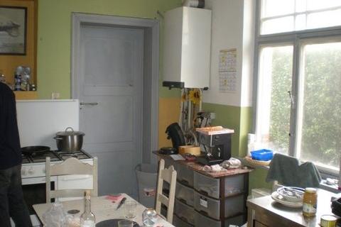 commercieel gelegen herenwoning