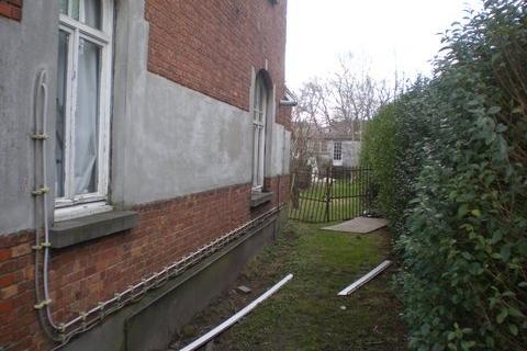 commercieel gelegen herenwoning