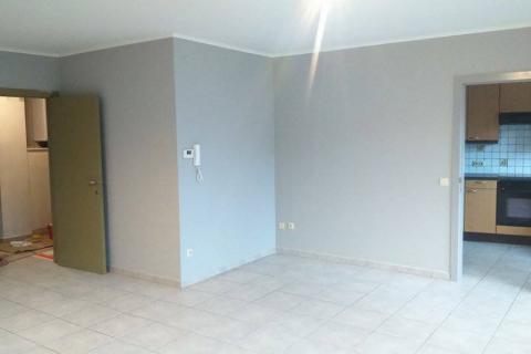 Modern appartement met 2 slaapkamers en garage te centrum Melle