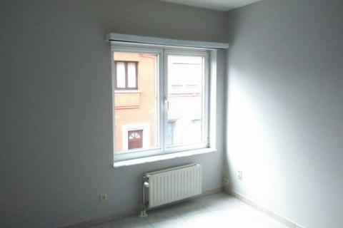 Modern appartement met 2 slaapkamers en garage te centrum Melle