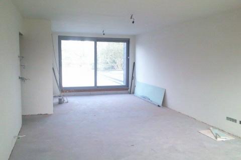 Nieuwbouwappartement op het eerste verdiep met 2 slaapkamers en terras.
