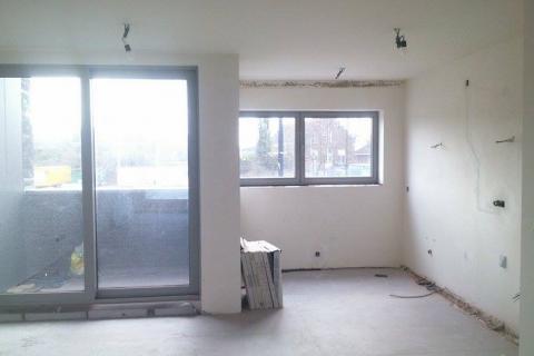 Nieuwbouwappartement op het eerste verdiep met 2 slaapkamers en terras.