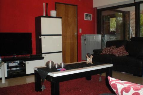 Gelijkvloers 2 slpk appartement te Melle Leeuw met garage. 