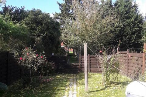 (OPTIE) Leuke rijwoning met 3 SLPK en tuin te centrum Melle 
