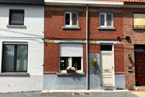 Landelijk gelegen sympathieke rijwoning.
