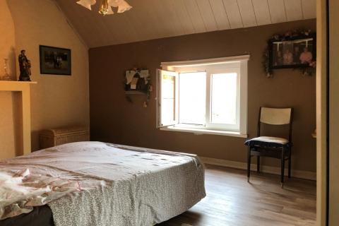 Landelijk gelegen sympathieke rijwoning.