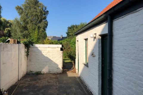 Sympathieke half-open bebouwing met leuke tuin