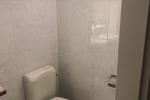 Ruim 2 slpk appartement met garage te Melle