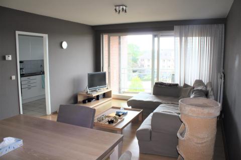 Ruim 2 slpk appartement met garage te Melle