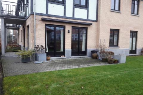 Ruim GLV appartement te Merelbeke met tuin en garage