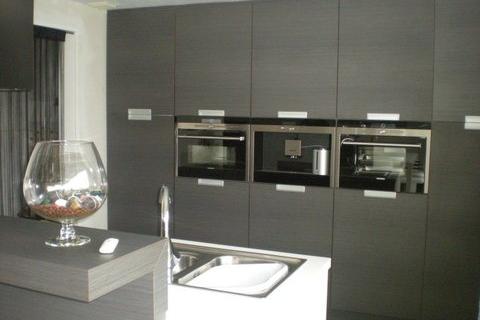 Bel-etage met 2 slaapkamers en garage te Melle
