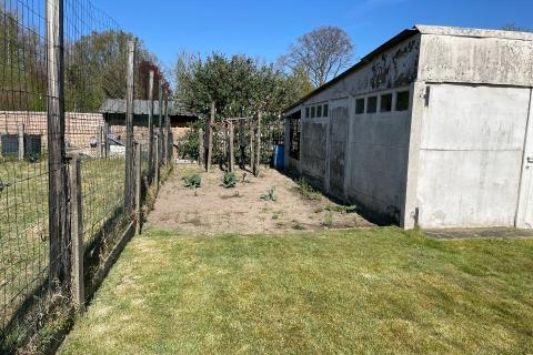 Ruime half open bebouwing met mooie grote tuin, terras en garage in Merelbeke-Melle, 4 slaapkamers, 
