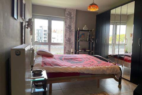 Ruim appartement met terras, garage en 2 slaapkamers in Gent - bouwjaar 2003, energielabel A, bewoonbare oppervlakte 113.00 - ideaal voor stadsliefhebbers!