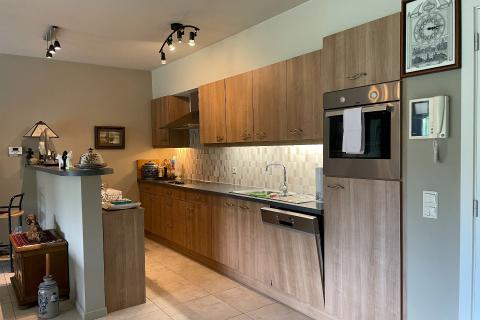 Ruim appartement met terras, garage en 2 slaapkamers in Gent - bouwjaar 2003, energielabel A, bewoonbare oppervlakte 113.00 - ideaal voor stadsliefhebbers!