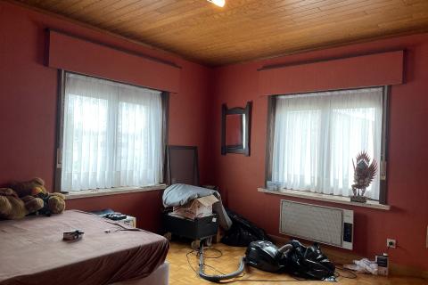 Ruime half open bebouwing met tuin, terras en garage in Merelbeke-Melle - 4 slaapkamers - Energielabel E - Zuidelijke oriëntatie van de tuin