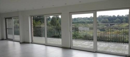 Uniek 2SLPK gelijkvloersappartement met zicht op Schelde + garage.