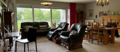 Ruim appartement met terras, garage en 2 slaapkamers in Gent - bouwjaar 2003, energielabel A, bewoonbare oppervlakte 113.00 - ideaal voor stadsliefhebbers!